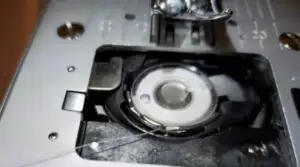 How to thread a Singer M1000